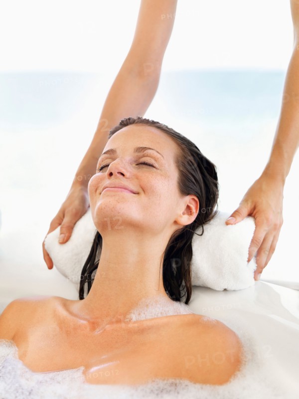 Woman receiving spa therapy