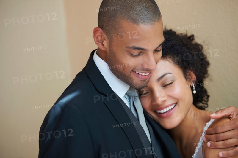 Bride and groom embracing