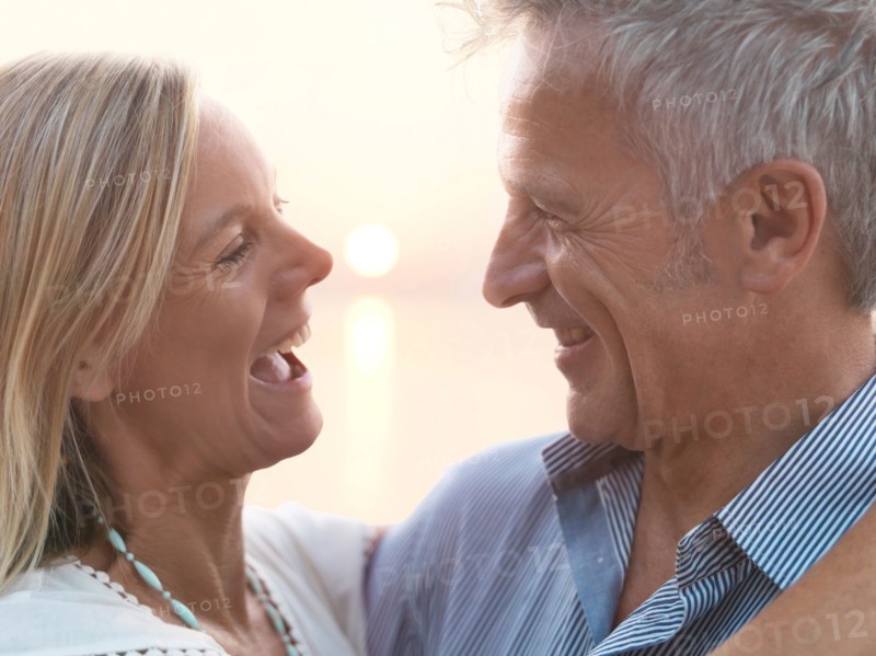 Portrait of mature couple at sunset