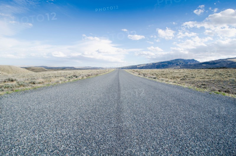Road going through desolate landscape