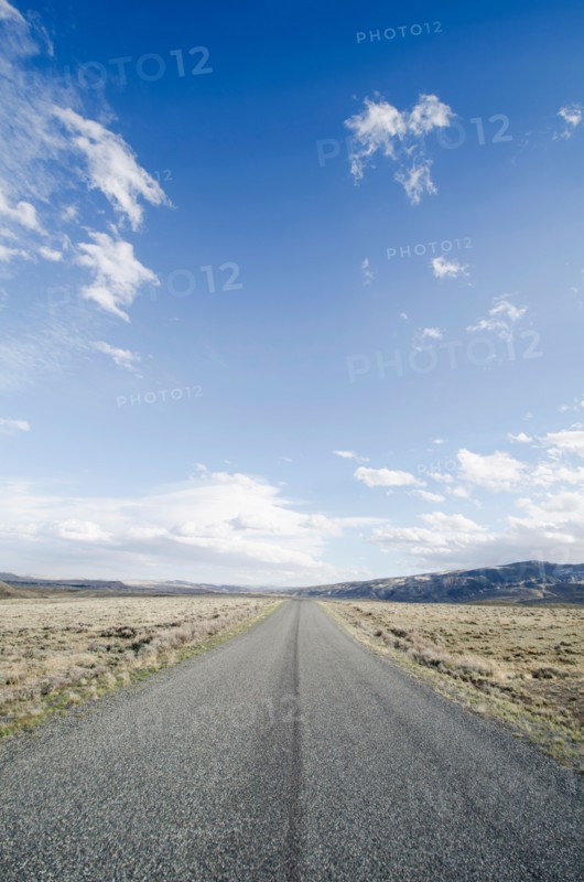 Road going through desolate landscape