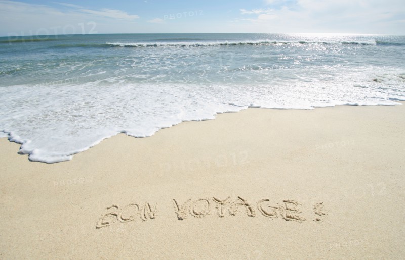 Bon Voyage' note on sand