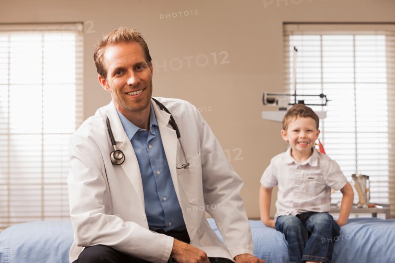 Pediatrician and boy (2-3)