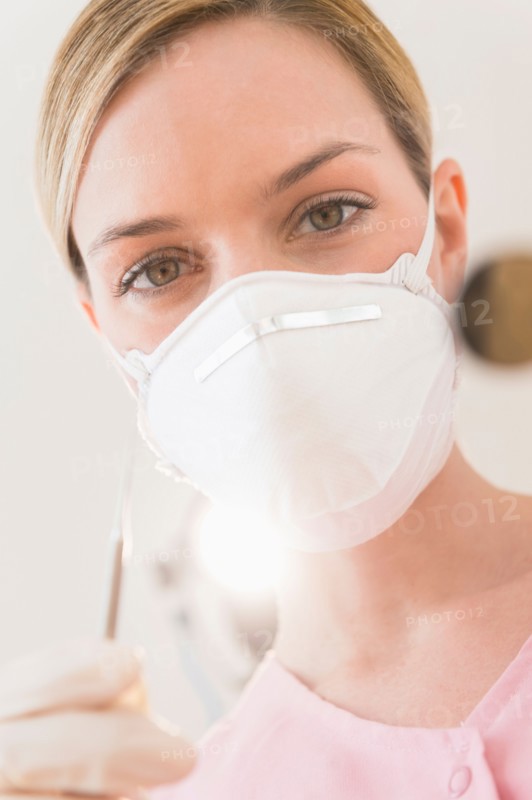 Portrait of female dentist.