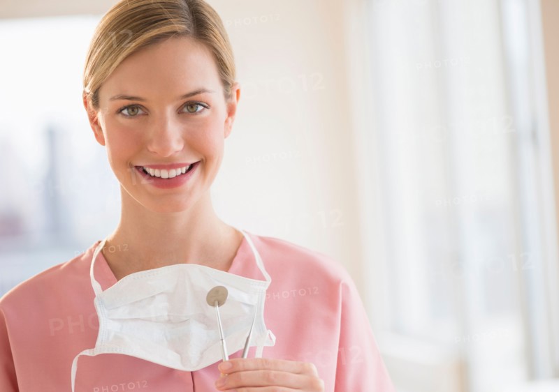 Portrait of female dentist.