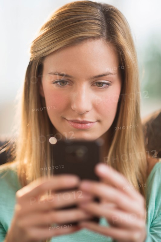 Woman using smartphone.