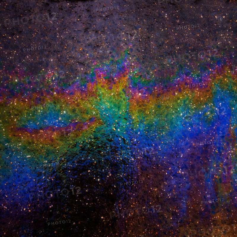 Oil spill on asphalt.