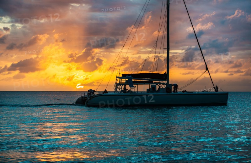 Catamaran on sea at sunset. Jamaica.