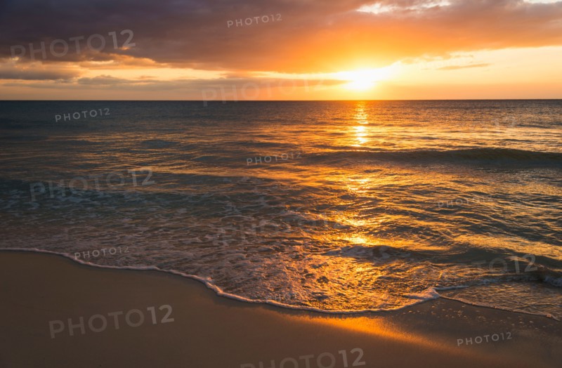 Sun setting over sea. Jamaica.