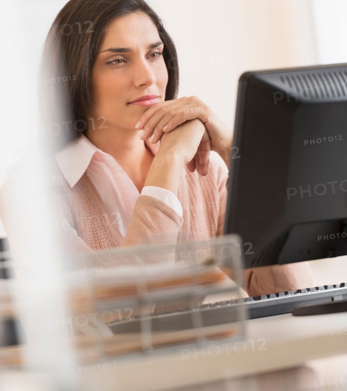 Businesswoman working on computer.