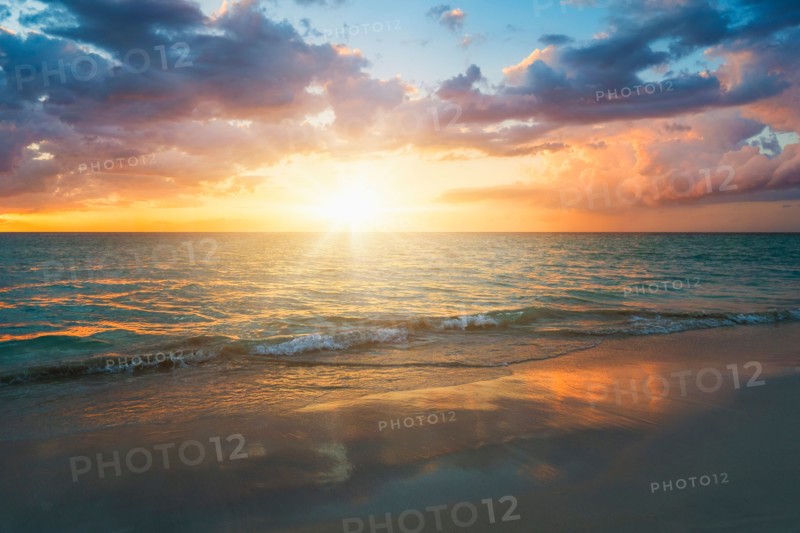 Sun setting over sea. Jamaica.
