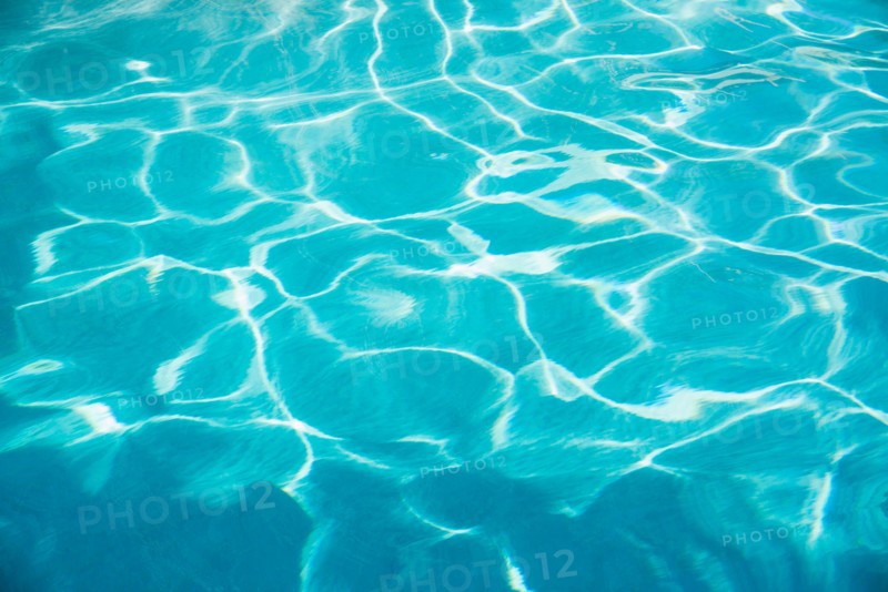 Water in swimming pool.