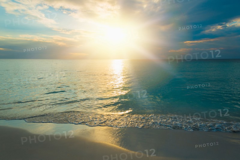 Sun setting over sea. Jamaica.