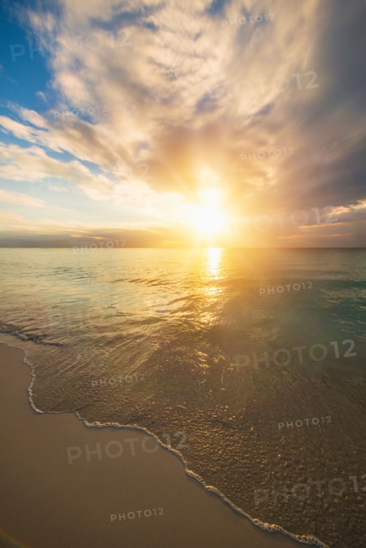 Sun setting over sea. Jamaica.