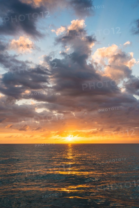 Sun setting over sea. Jamaica.