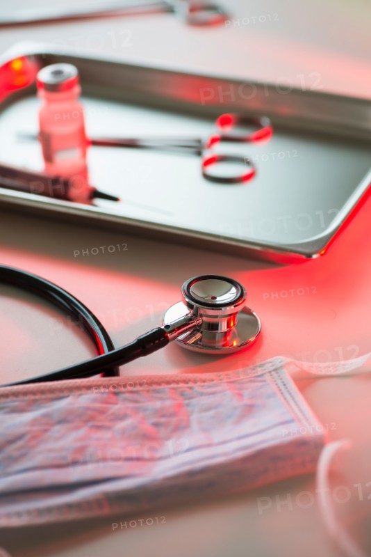 Close up of stethoscope and medication, studio shot.