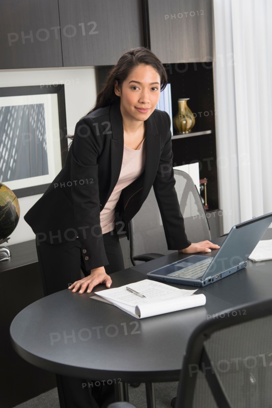 Portrait of businesswoman in office.