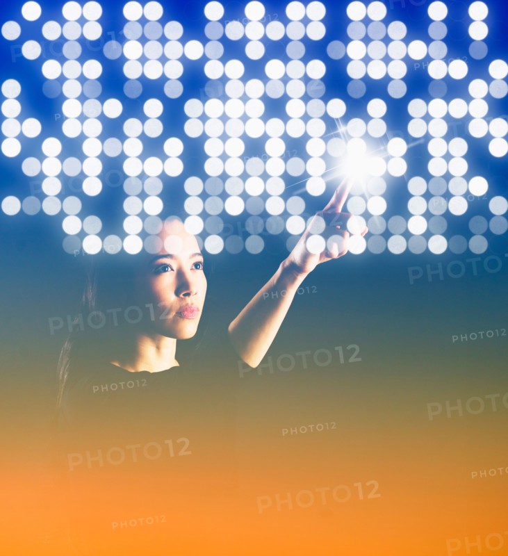 Portrait of young woman with digital pattern.