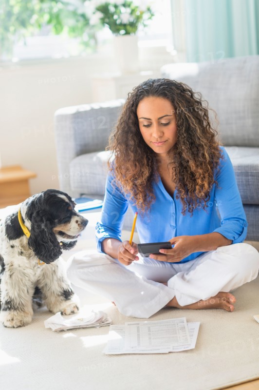Young woman dealing with home finance.