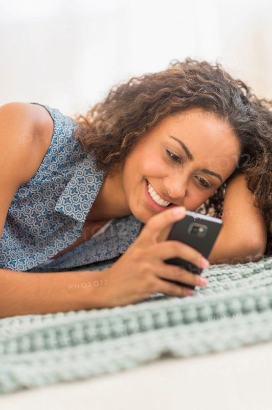 Young woman using smartphone.