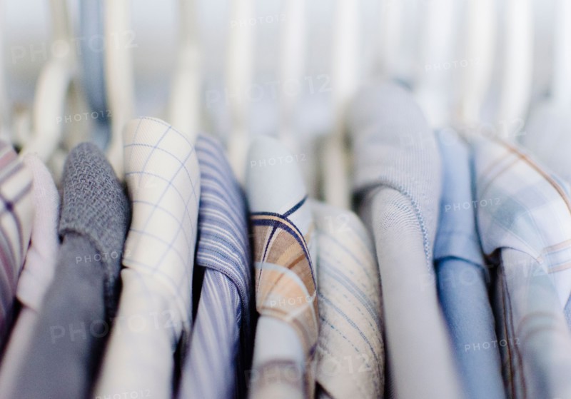 Close-up view of shirts in on rack