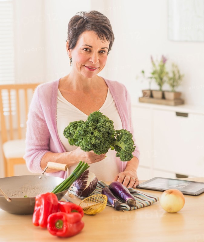 Portrait of mature woman in kitchen