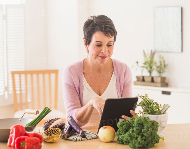 Portrait of mature woman in kitchen