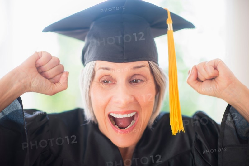 Portrait of woman in graduation cap
