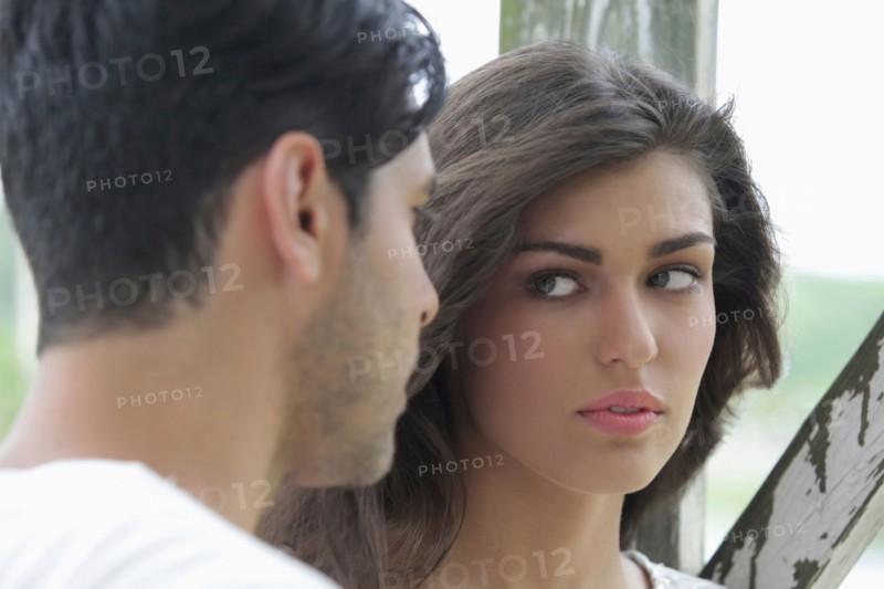 Portrait of couple looking at each other