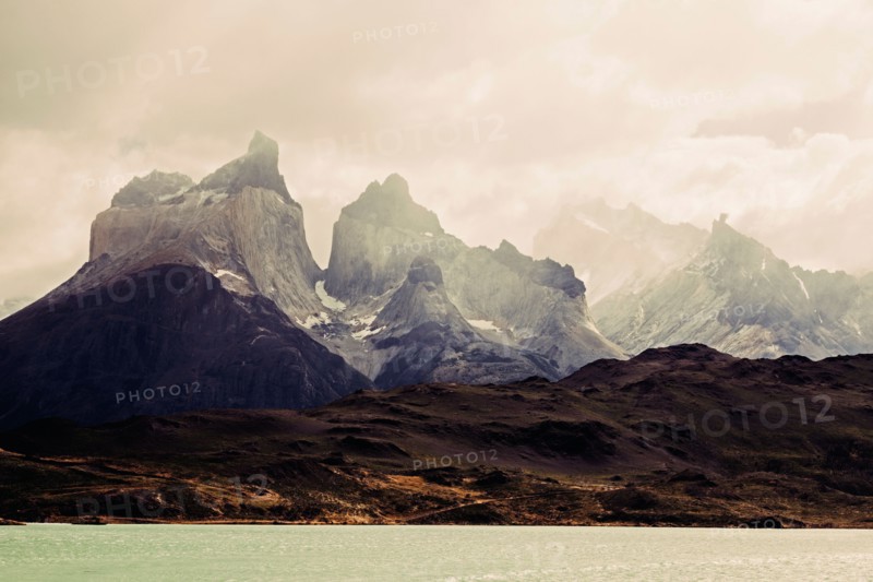 Scenic view of mountain range at sunrise