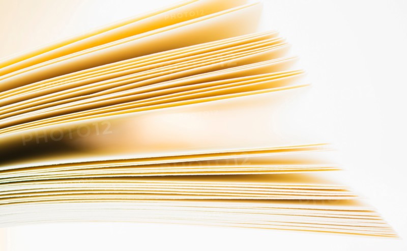 Book pages in motion.