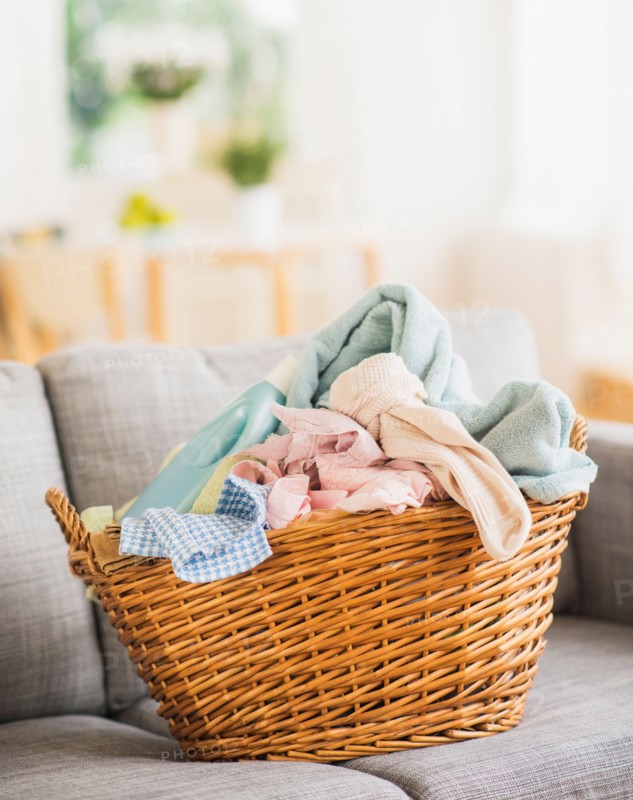 Laundry basket on sofa