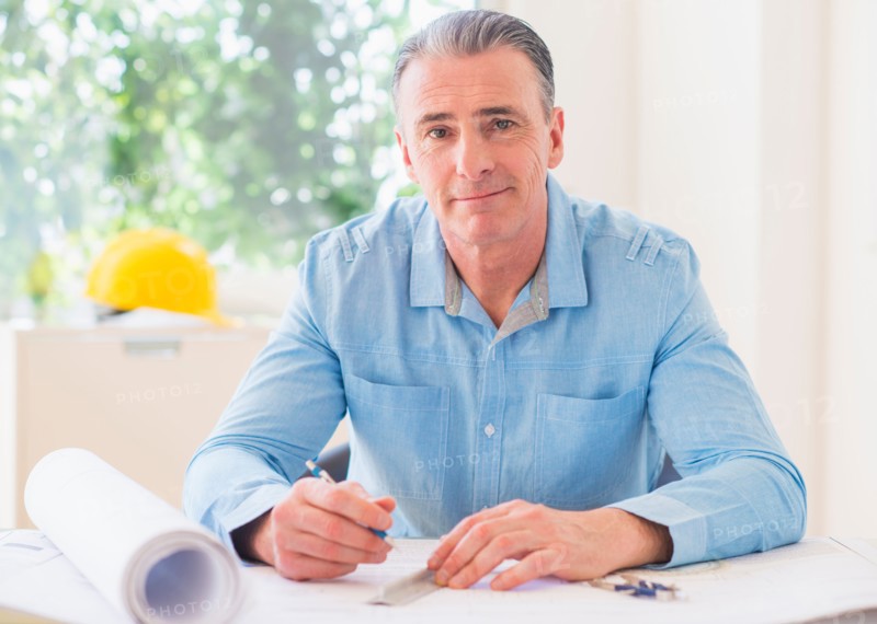 Portrait of man working in office