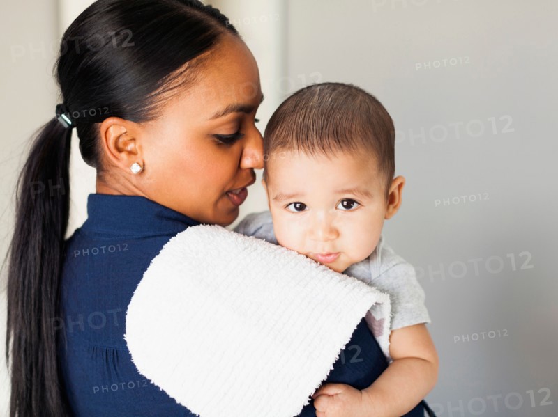 Mother with her baby boy (2-5 months)