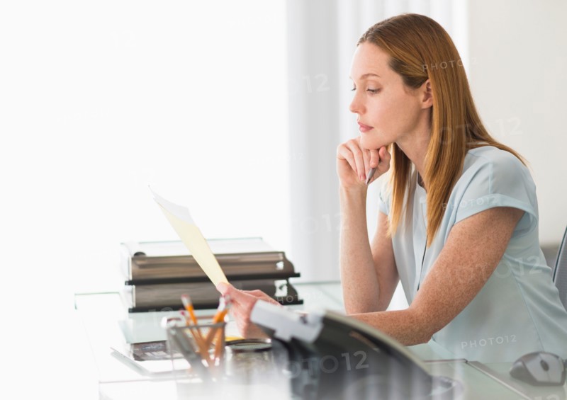 Business woman working in office.