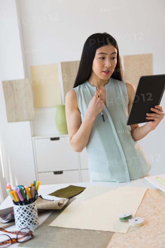 Business woman using tablet pc.