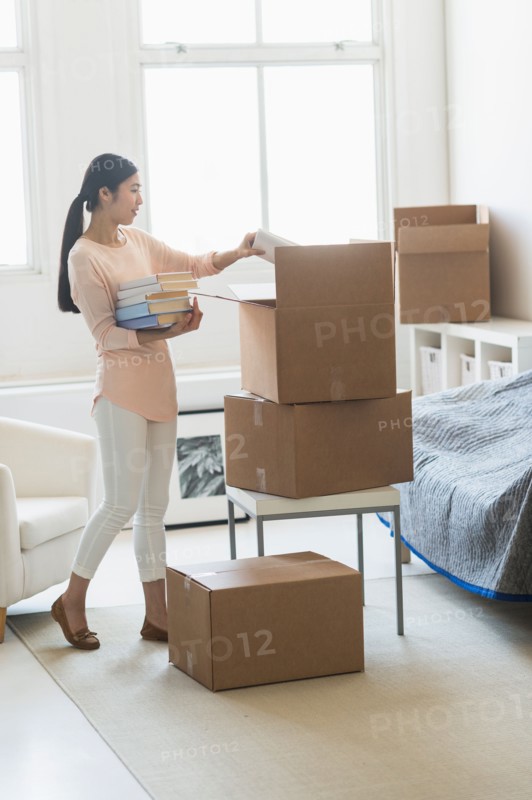 Woman moving home.