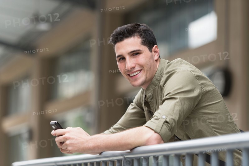 Man text messaging.