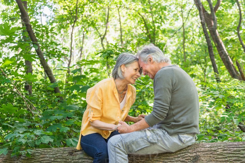 Central Park, New York City. Senior couple relaxing in park.