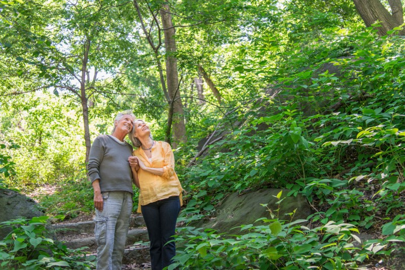 Central Park, New York City. Senior couple relaxing in park.