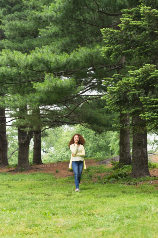 Central Park, New York City. Woman relaxing in park.