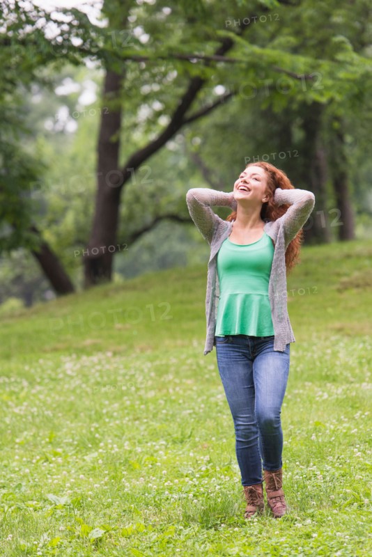 Central Park, New York City. Woman relaxing in park.