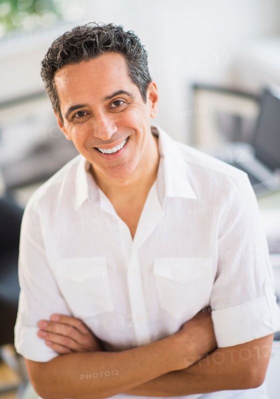 Portrait of cheerful photographer