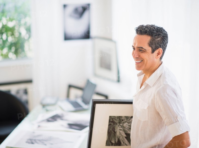 Portrait of man in his photography studio
