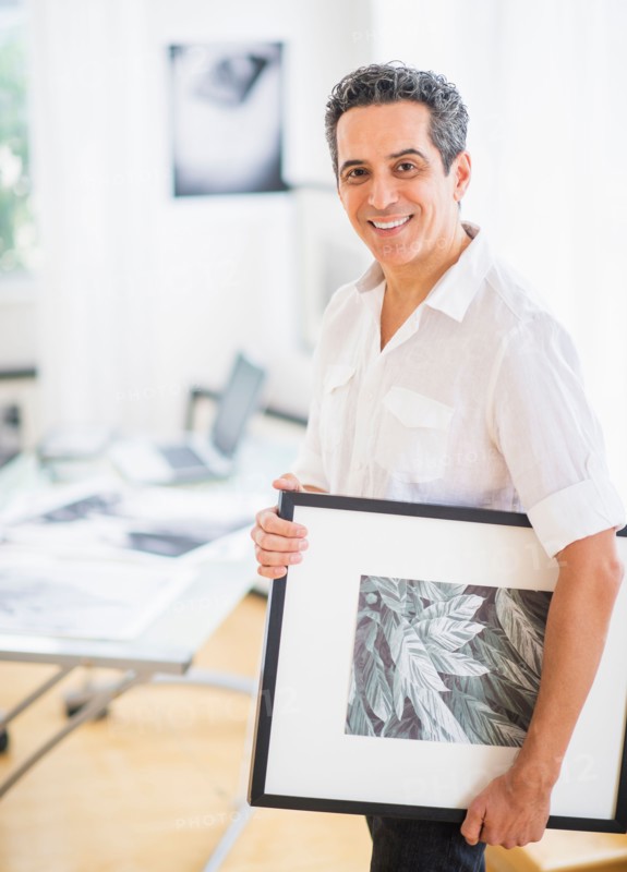 Portrait of man in his photography studio