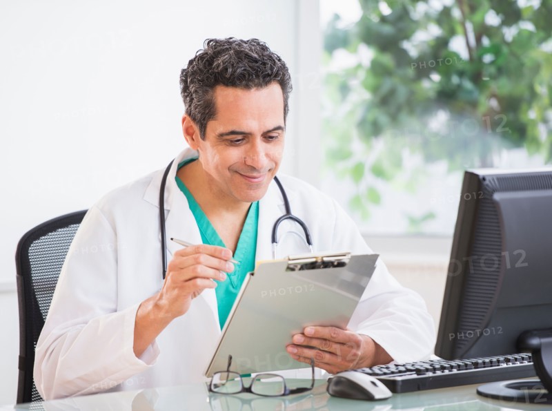 Portrait of doctor working in office