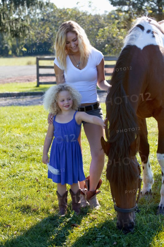 Mother with daughter (4-5) outdoors