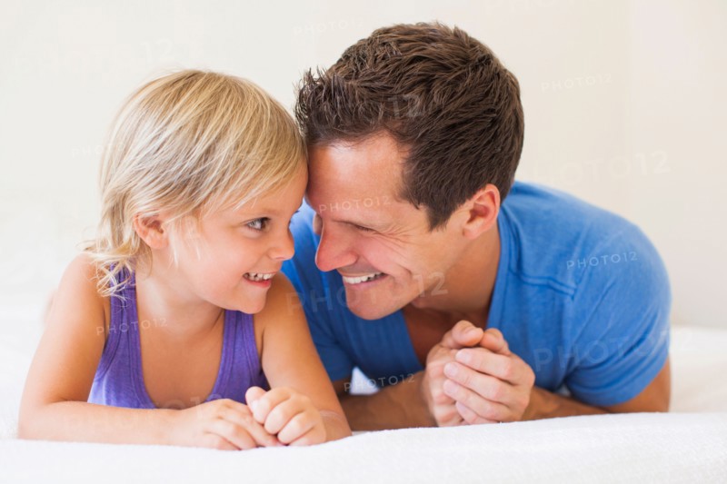 Father playing with daughter (2-3)