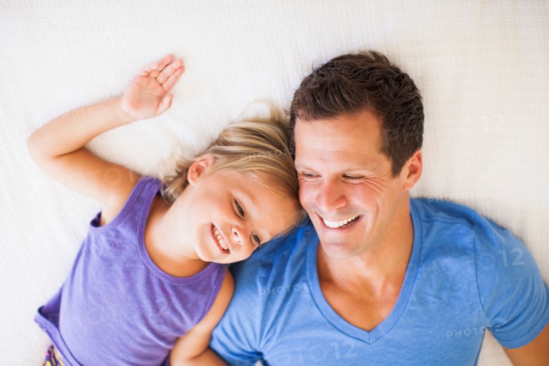 Father playing with daughter (2-3)
