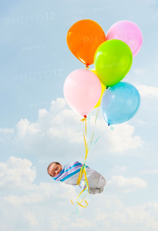 Newborn baby delivered by balloons.